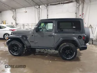 2021 Jeep Wrangler Sport S with VIN 1C4GJXAN7MW647786, listed as a IAAI auction lot 41685775 with 31,907 mi miles and . Bid and sale history available at DreamBid. Image 14.