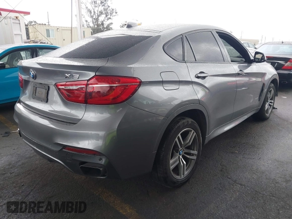 2016 BMW X6 xDrive50i with VIN 5UXKU6C59G0S82526, listed as a IAAI auction lot 41786622 with 110,796 mi miles and . Bid and sale history available at DreamBid. Image 4.