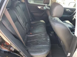 2009 Infiniti FX z VIN JNRAS18W79M153932, wystawiony jako Copart lot #52904095 z przebiegiem 170 407 mil mil oraz Szkoda całkowita • Salvage title. Historia ofert i sprzedaży dostępna na DreamBid. Obrazek 10.