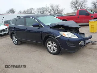 2012 Mazda CX-9 Sport z VIN JM3TB2BA9C0361229, wystawiony jako IAAI lot #41512857 z przebiegiem 117 154 mil mil oraz . Historia ofert i sprzedaży dostępna na DreamBid. Obrazek 1.
