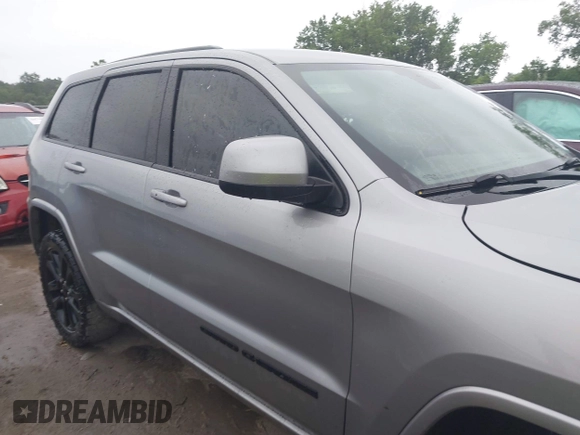 2018 Jeep Grand Cherokee Laredo E with VIN 1C4RJFAG6JC452859, listed as a IAAI auction lot 42647127 with 107,869 mi miles and . Bid and sale history available at DreamBid. Image 12.