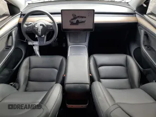 2024 Tesla Model Y Long Range with VIN 7SAYGDEE1RA234401, listed as a Copart auction lot 44199495 with 17,900 mi miles and Clean Title. Bid and sale history available at DreamBid. Image 8.