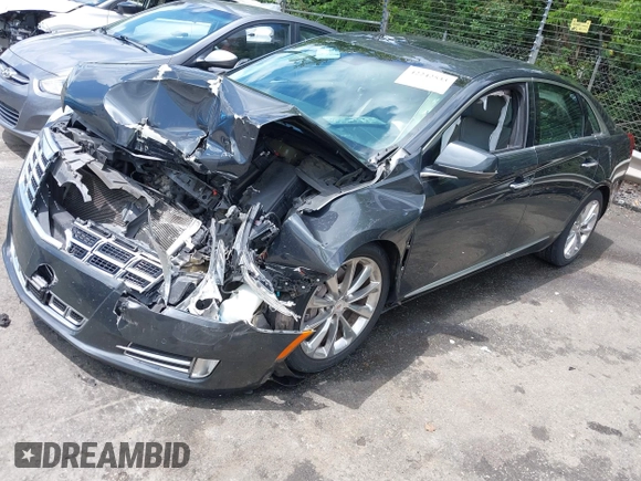 2013 Cadillac XTS Luxury z VIN 2G61P5S34D9109189, wystawiony jako IAAI lot #42242533 z przebiegiem 178 234 mil mil oraz . Historia ofert i sprzedaży dostępna na DreamBid. Obrazek 19.