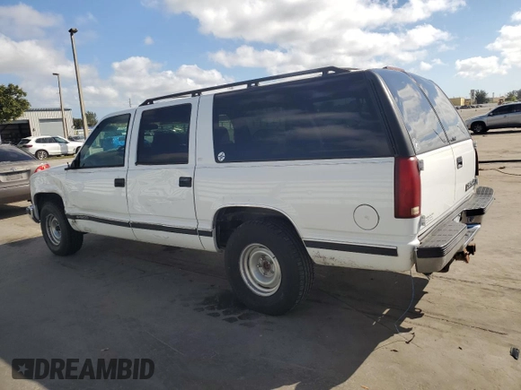 1999 Chevrolet Suburban with VIN 3GNEC16R5XG213001, listed as a Copart auction lot 43498865 with 236,306 mi miles and Salvage Title. Bid and sale history available at carsss.com. Image 2.