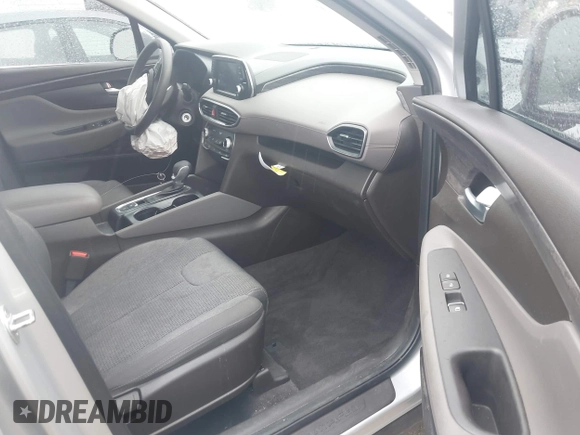 2019 Hyundai Santa Fe SE z VIN 5NMS23AD4KH130517, wystawiony jako IAAI lot #42324854 z przebiegiem 76 963 mil mil oraz . Historia ofert i sprzedaży dostępna na DreamBid. Obrazek 5.