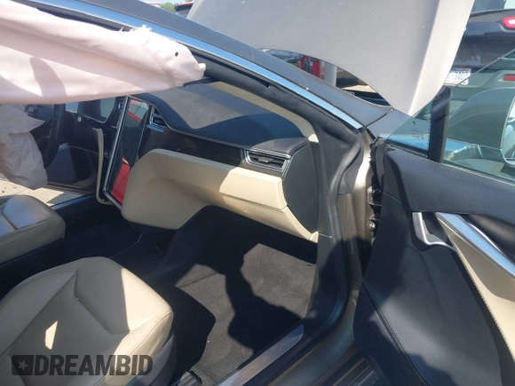 2016 Tesla Model S 70 with VIN 5YJSA1E1XGF126620, listed as a IAAI auction lot 40227035 with 71,400 mi miles and . Bid and sale history available at DreamBid. Image 5.