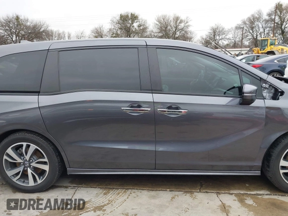 2021 Honda Odyssey Touring with VIN 5FNRL6H86MB021504, listed as a IAAI auction lot 41550040 with 55,068 mi miles. Bid and sale history available at carsss.com. Image 14.