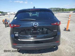 2023 Mazda CX-5 S Carbon Edition z VIN JM3KFBCM3P0264493, wystawiony jako Copart lot #52118475 z przebiegiem 3 195 mil mil oraz Szkoda całkowita • Salvage title. Historia ofert i sprzedaży dostępna na DreamBid. Obrazek 6.