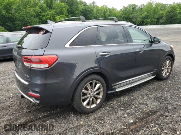 2016 Kia Sorento SX z VIN 5XYPKDA51GG152979, wystawiony jako Copart lot #57942165 z przebiegiem 189 283 mil mil oraz Szkoda całkowita • Salvage title. Historia ofert i sprzedaży dostępna na DreamBid. Obrazek 3.