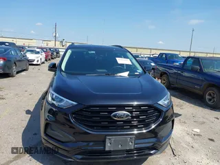 2023 Ford Edge SE z VIN 2FMPK4G90PBA05532, wystawiony jako IAAI lot #41845991 z przebiegiem 39 568 mil mil oraz . Historia ofert i sprzedaży dostępna na DreamBid. Obrazek 12.