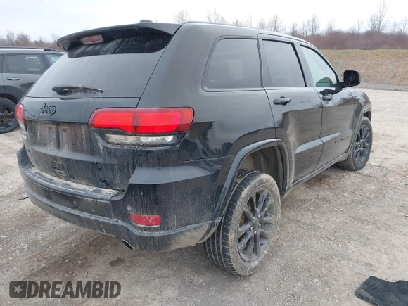 2019 Jeep Grand Cherokee Laredo E with VIN 1C4RJFAGXKC674676, listed as a IAAI auction lot 41942125 with 72,151 mi miles. Bid and sale history available at carsss.com. Image 4.
