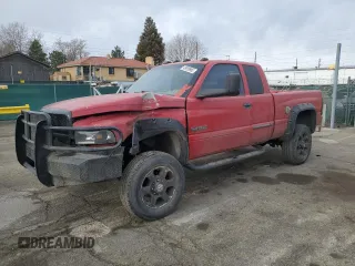 2001 Dodge 2500 z VIN 3B7KF23671G223247, wystawiony jako Copart lot #48939985 z przebiegiem 303 894 mil mil oraz Szkody całkowita. Historia ofert i sprzedaży dostępna na DreamBid. Obrazek 1.