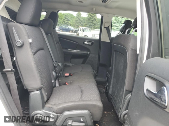 2017 Dodge Journey SXT with VIN 3C4PDDBG0HT542623, listed as a Copart auction lot 61628385 with 130,285 mi miles and Salvage title. Bid and sale history available at DreamBid. Image 11.