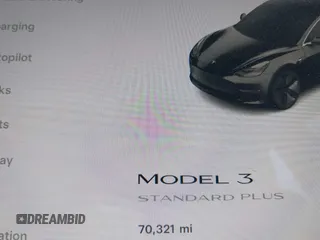 2019 Tesla Model 3 Mid Range with VIN 5YJ3E1EA2KF362048, listed as a IAAI auction lot 40141734 with 70,321 mi miles and . Bid and sale history available at carsss.com. Image 7.
