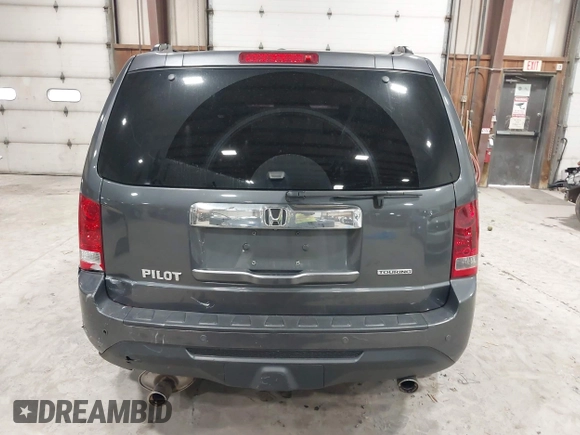 2012 Honda Pilot Touring with VIN 5FNYF4H99CB052034, listed as a IAAI auction lot 42023430 with 137,428 mi miles. Bid and sale history available at carsss.com. Image 16.