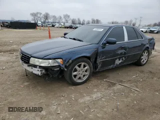2002 Cadillac Seville Touring STS z VIN 1G6KY54932U174599, wystawiony jako Copart lot #44996845 z przebiegiem 168 819 mil mil oraz Szkody całkowita. Historia ofert i sprzedaży dostępna na DreamBid. Obrazek 1.