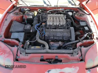 1996 Mitsubishi 3000GT GT z VIN JA3AM84J2TY003206, wystawiony jako Copart lot #71827984 z przebiegiem 222 405 mil mil oraz Czysty tytuł • Clean title. Historia ofert i sprzedaży dostępna na DreamBid. Obrazek 11.