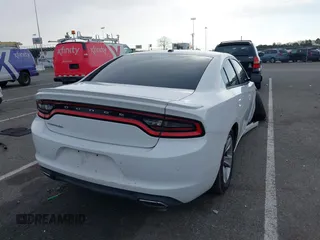 2015 Dodge Charger SE z VIN 2C3CDXBG6FH874656, wystawiony jako IAAI lot #41886805 z przebiegiem 121 568 mil mil oraz . Historia ofert i sprzedaży dostępna na DreamBid. Obrazek 4.