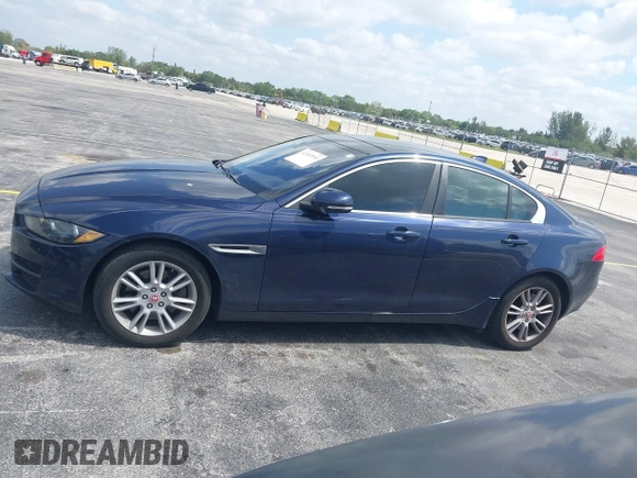 2019 Jaguar XE 25t Premium with VIN SAJAD4FX4KCP47267, listed as a IAAI auction lot 42113311 with 63,914 mi miles. Bid and sale history available at carsss.com. Image 14.