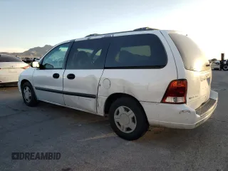 2002 Ford Windstar LX with VIN 2FMZA51492BB27040, listed as a Copart auction lot 49712345 with 86,157 mi miles and Salvage Title. Bid and sale history available at carsss.com. Image 2.