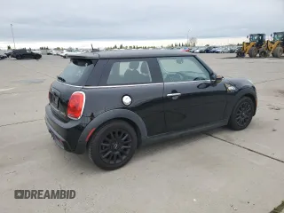 2014 MINI Hardtop S with VIN WMWXM7C57ET987069, listed as a Copart auction lot 52147955 with 121,276 mi miles and Salvage Title. Bid and sale history available at DreamBid. Image 3.