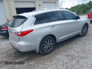 2014 Infiniti QX60 with VIN 5N1AL0MN2EC553994, listed as a IAAI auction lot 42251356 with 168,277 mi miles and . Bid and sale history available at DreamBid. Image 4.