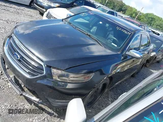 2013 Ford Taurus Limited z VIN 1FAHP2F81DG103292, wystawiony jako IAAI lot #42219104 z przebiegiem 86 085 mil mil oraz . Historia ofert i sprzedaży dostępna na DreamBid. Obrazek 2.
