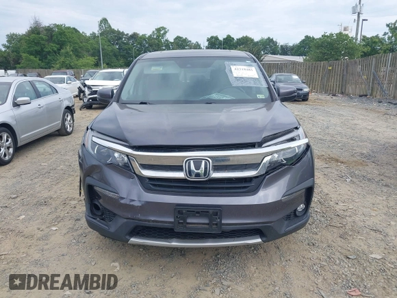 2019 Honda Pilot EX-L with VIN 5FNYF5H45KB018293, listed as a IAAI auction lot 42318481 with 76,617 mi miles and . Bid and sale history available at DreamBid. Image 12.