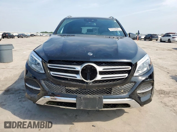 2018 Mercedes-Benz GLE 350 with VIN 4JGDA5HB6JB065910, listed as a Copart auction lot 57254925 with 59,584 mi miles and Salvage title. Bid and sale history available at DreamBid. Image 5.
