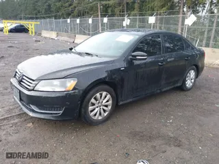2014 Volkswagen Passat Wolfsburg Ed with VIN 1VWAT7A35EC093520, listed as a IAAI auction lot 41594539 with 139,779 mi miles. Bid and sale history available at carsss.com. Image 2.