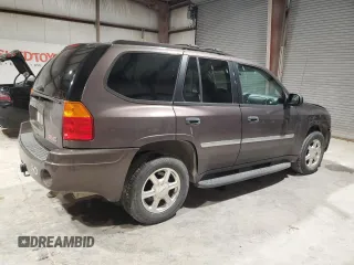 2008 GMC Envoy SLE2 with VIN 1GKDS13S482236329, listed as a Copart auction lot 87001674 with 150,807 mi miles and Salvage Title. Bid and sale history available at carsss.com. Image 3.