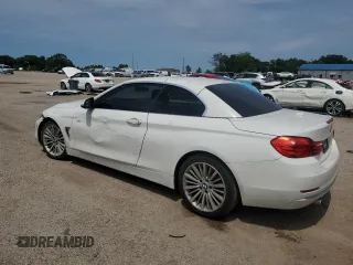 2014 BMW 4 Series 435i with VIN WBA3T3C55EP736862, listed as a Copart auction lot 57089135 with 113,801 mi miles and Salvage title. Bid and sale history available at DreamBid. Image 2.