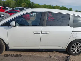 2015 Honda Odyssey EX-L z VIN 5FNRL5H61FB055684, wystawiony jako IAAI lot #42013480 z przebiegiem 221 381 mil mil oraz . Historia ofert i sprzedaży dostępna na DreamBid. Obrazek 15.
