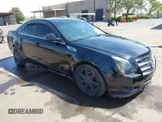 2008 Cadillac CTS RWD with VIN 1G6DV57VX80188428, listed as a IAAI auction lot 42033872 with 132,080 mi miles and . Bid and sale history available at DreamBid. Image 1.