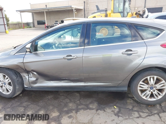 2012 Ford Focus SEL with VIN 1FAHP3M29CL314685, listed as a IAAI auction lot 41974881 with 167,119 mi miles. Bid and sale history available at carsss.com. Image 14.