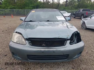 2000 Honda Civic EX z VIN 1HGEJ8644YL006150, wystawiony jako IAAI lot #42149964 z przebiegiem 195 489 mil mil oraz . Historia ofert i sprzedaży dostępna na DreamBid. Obrazek 13.