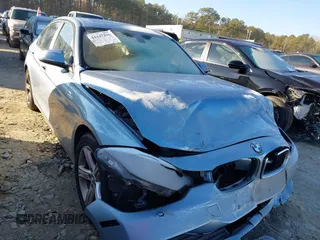 2013 BMW 3 Series 320i with VIN WBA3B1C56DK128321, listed as a IAAI auction lot 41347216 with 91,906 mi miles. Bid and sale history available at carsss.com. Image 1.