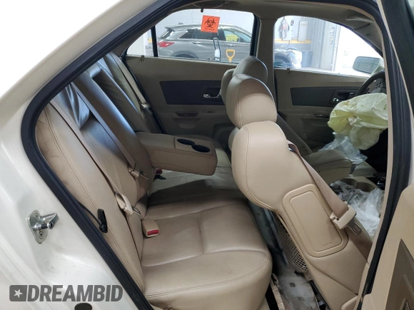 2006 Cadillac CTS z VIN 1G6DP577660112875, wystawiony jako Copart lot #87670565 z przebiegiem Nie podano mil oraz Szkoda całkowita • Salvage title. Historia ofert i sprzedaży dostępna na DreamBid. Obrazek 10.