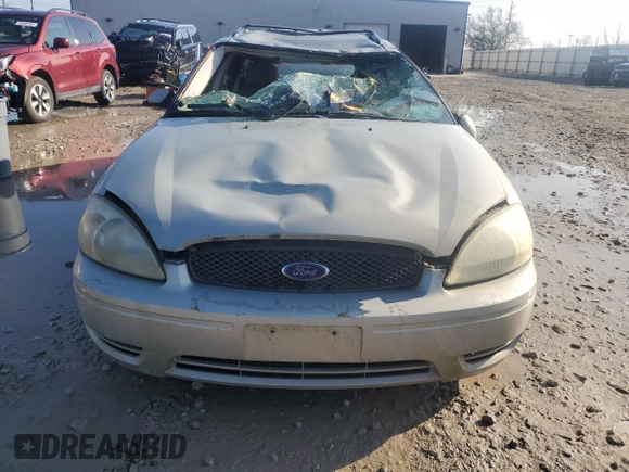2004 Ford Taurus z VIN 1FAFP59SX4A141848, wystawiony jako Copart lot #79389104 z przebiegiem Nie podano mil oraz Nie do naprawy. Historia ofert i sprzedaży dostępna na DreamBid. Obrazek 5.