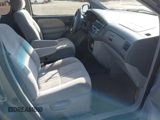 2000 Toyota Sienna CE with VIN 4T3ZF19C8YU272134, listed as a IAAI auction lot 41505762 with 234,706 mi miles. Bid and sale history available at carsss.com. Image 5.