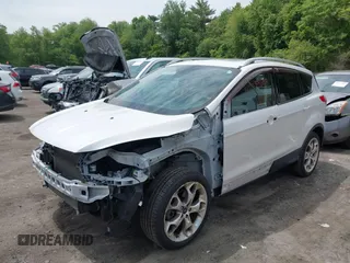 2016 Ford Escape Titanium with VIN 1FMCU9J92GUA71444, listed as a IAAI auction lot 42334603 with 79,780 mi miles and . Bid and sale history available at DreamBid. Image 19.