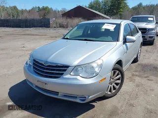 2010 Chrysler Sebring Limited with VIN 1C3CC5FB1AN203515, listed as a IAAI auction lot 42063786 with 171,035 mi miles and . Bid and sale history available at DreamBid. Image 2.