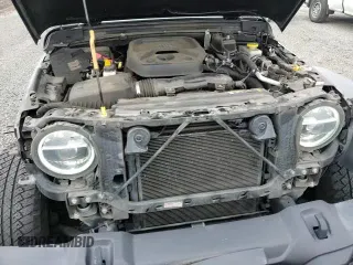 2021 Jeep Wrangler Willys с VIN 1C4GJXAN0MW761080, выставлен на аукционе Copart как лот 80141745 с пробегом 113 796 миль миль и Списание • Salvage title. История ставок и продаж доступна на DreamBid. Изображение 16.