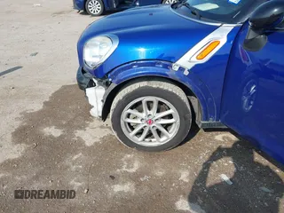 2015 MINI Countryman with VIN WMWZB3C56FWR43443, listed as a IAAI auction lot 41920848 with 91,192 mi miles and . Bid and sale history available at DreamBid. Image 6.