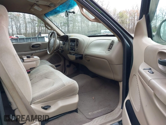 2001 Ford F-150 XL with VIN 1FTRX18LX1NA33311, listed as a IAAI auction lot 41940094 with 202,534 mi miles. Bid and sale history available at carsss.com. Image 5.