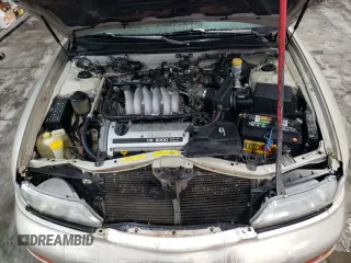 1998 Nissan Maxima GXE with VIN JN1CA21D3WT532196, listed as a Copart auction lot 43210915 with 277,946 mi miles and Salvage title. Bid and sale history available at DreamBid. Image 12.