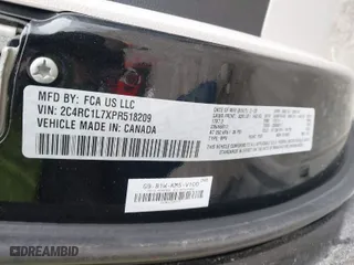 2023 Chrysler Pacifica Hybrid Touring L with VIN 2C4RC1L7XPR518209, listed as a IAAI auction lot 41038104 with 35,969 mi miles. Bid and sale history available at carsss.com. Image 9.