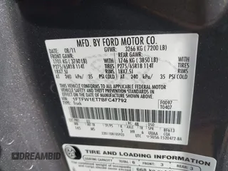 2011 Ford F-150 XLT with VIN 1FTFW1ET7BFC47792, listed as a IAAI auction lot 41765574 with 174,001 mi miles. Bid and sale history available at carsss.com. Image 9.