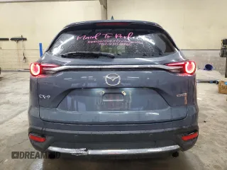 2021 Mazda CX-9 Carbon Edition with VIN JM3TCADY2M0527657, listed as a Copart auction lot 46650145 with 69,439 mi miles and Salvage title. Bid and sale history available at DreamBid. Image 6.