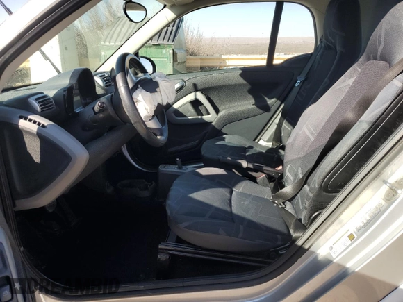 2010 Smart fortwo Pure with VIN WMEEJ3BA4AK341838, listed as a Copart auction lot 42514165 with 86,418 mi miles and Salvage title. Bid and sale history available at DreamBid. Image 7.